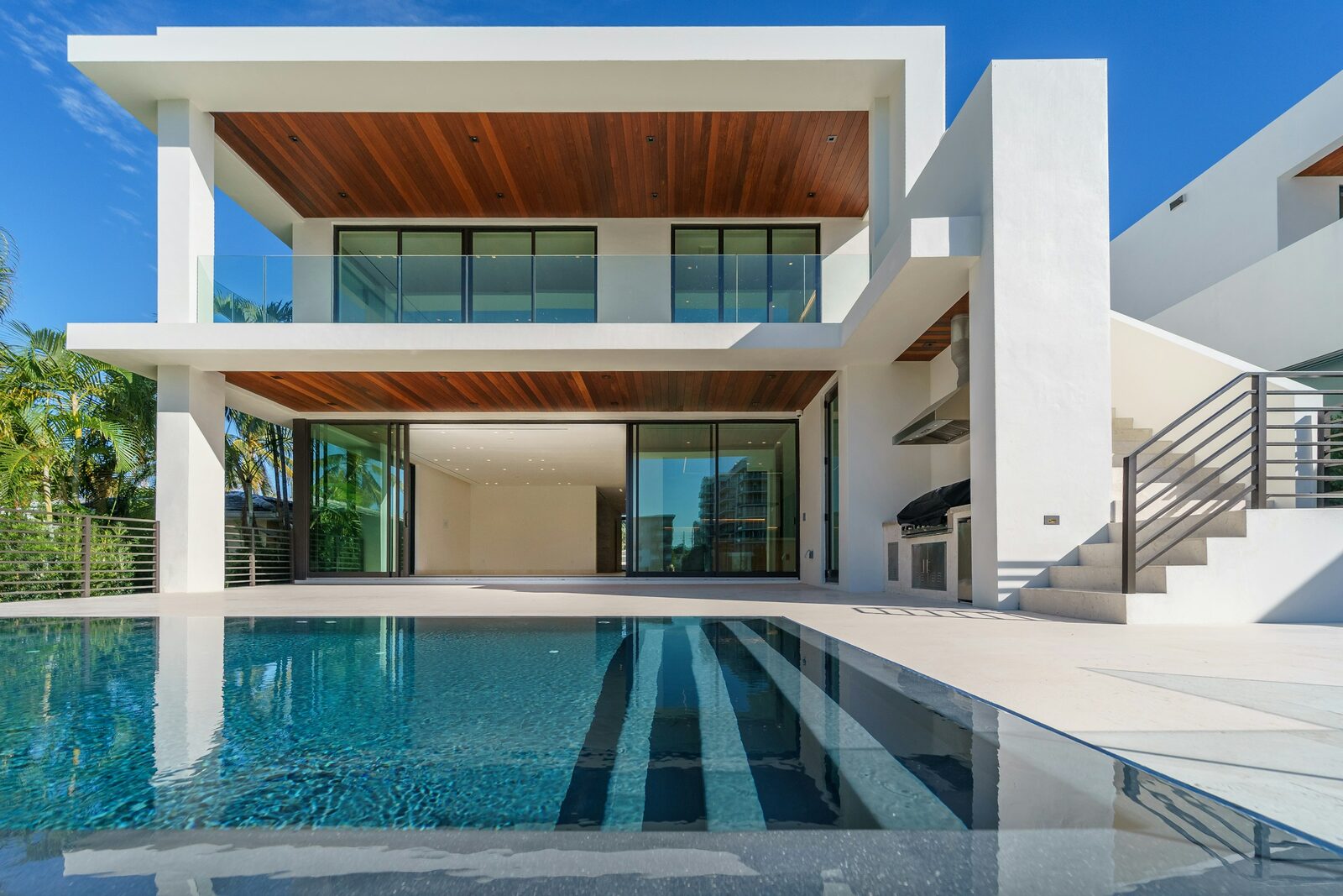Contemporary home exterior with clean architectural lines and a pool