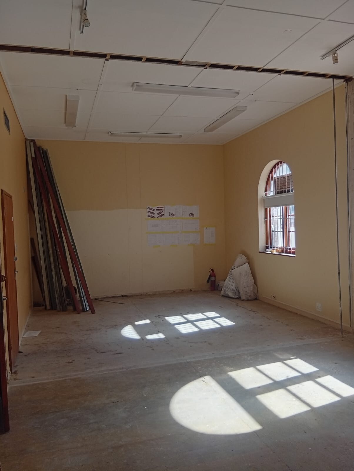 The room stripped back to a bare shell before work began
