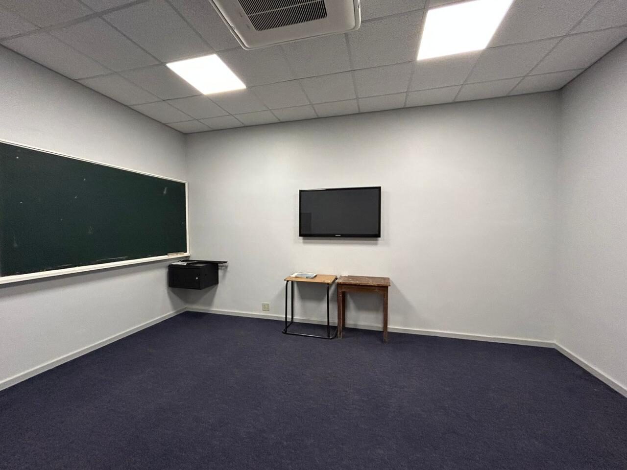 The finished room — new suspended ceiling, recessed lighting and air-conditioning all commissioned